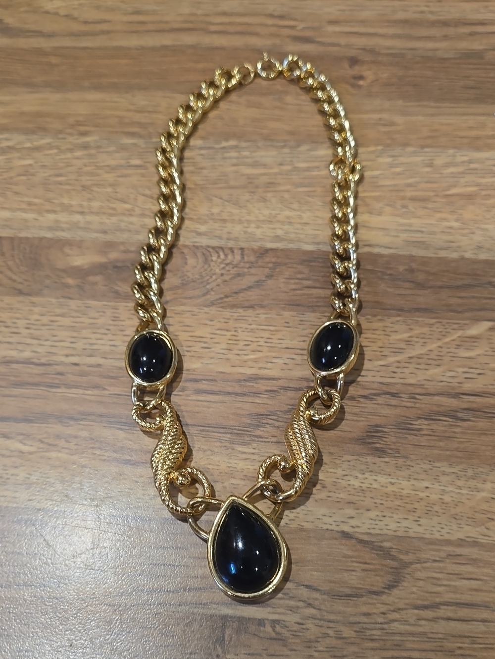 Gold-Tone Necklace with Black Teardrop and Cabochon Accents